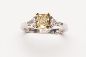 PLAT/18KT .78CT RAD SI1 FANCY YELLOW W .25CTTW TRILL