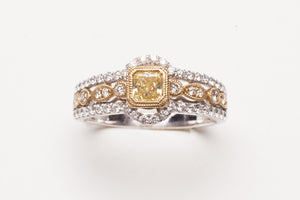 Lady's Two-Tone Fashion Ring With 54=0.38Tw Round Diamonds And One 0.33Ct Princess Cut Yellow Diamond