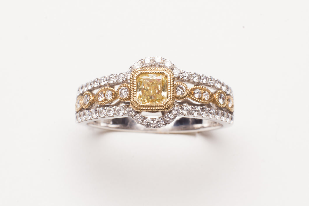 Lady's Two-Tone Fashion Ring With 54=0.38Tw Round Diamonds And One 0.33Ct Princess Cut Yellow Diamond