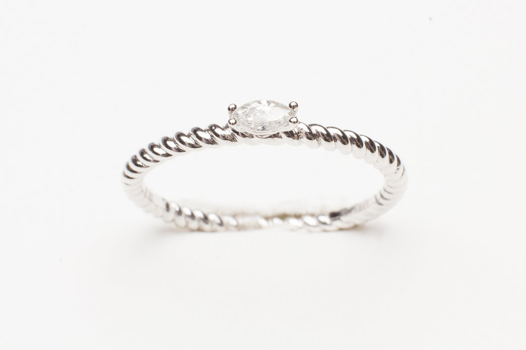 18KT WG STACK RING WITH .09 MQ DIA