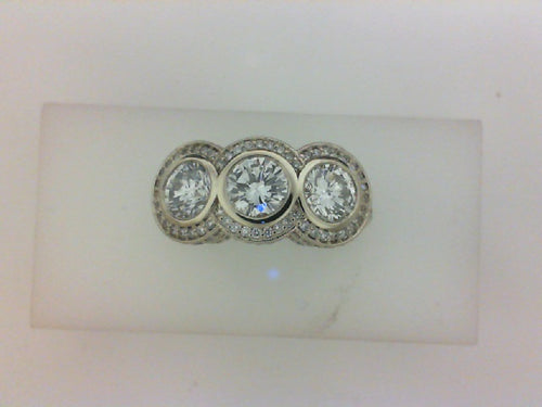 1.62CTTW 3 STONE RING WITH 158 RD DIA .49CTTW