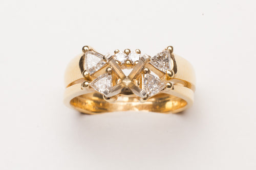 SEMI DIA .63CT TW 2RD&4TRI 14KT YG  RING