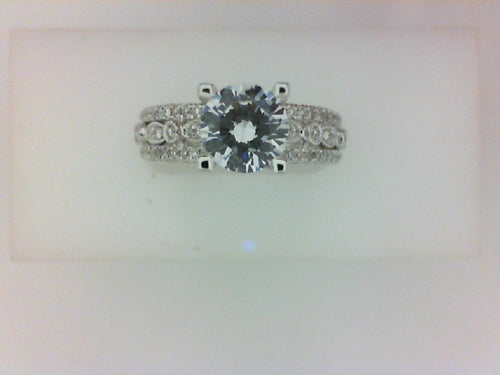 18KT WG .56CTTW SEMI W CZ CENTER