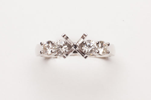 18KT WG 4 RD DIA .60CTTW PRONG SET