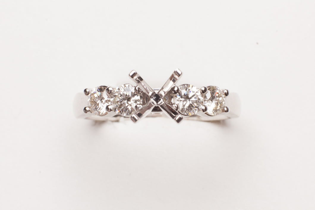18KT WG 4 RD DIA .60CTTW PRONG SET