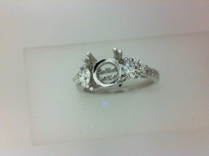 14KT WG .72CTTW  RD 3 STONE CENTER SEMI W DIA SIDES