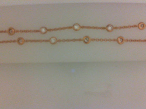 18KT RG 1.23CTTW 27 RD DIA 18