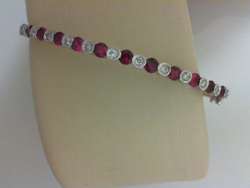 18KT WG .29CTTW 13 RD DIA W 1.39CTTW 12 RUBIES DIA BANGLE BRACELET
