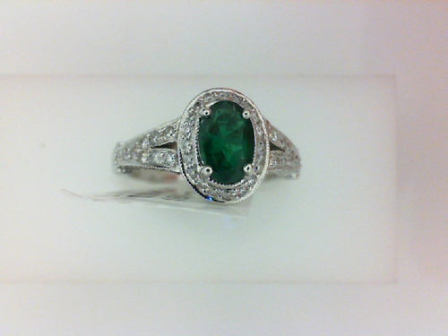 18KT WG .60CTTW 104 RD DIA W ..64CTTW OVL EMER RG