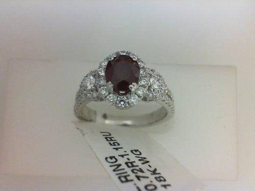18KT WG .72CTTW 54 RD DIA W 1.15CTTW OVL RUBY RG