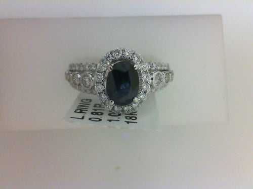 18KT WG 1.02CT OVL SAP W .81CTTW 74 RD DIA RING