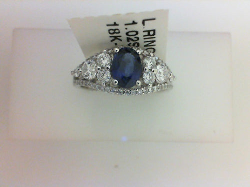 18KT WG 1.02CTTW OVL SAPH / .76CTTW 58 RD DIA RING
