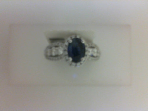 18KT WG .94CTTW 82RD DIA/ 1.04CT OVAL SAPH RG