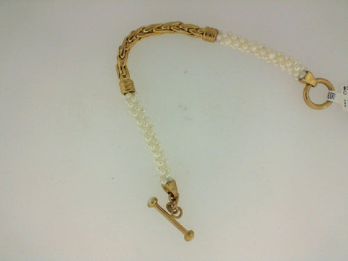 YG LINK IN CENTER OF PEARL BRAC W TOGGEL CLASP
