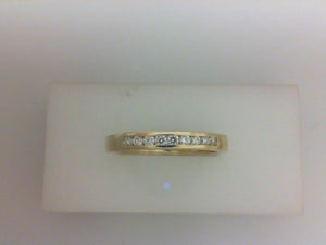 14K YG .20CTTW RD DIA CHANNEL BAND