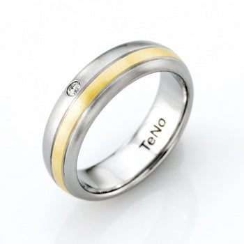 TAMOR 6MM W .04CT DIA 18KT 1 2ROUND RING